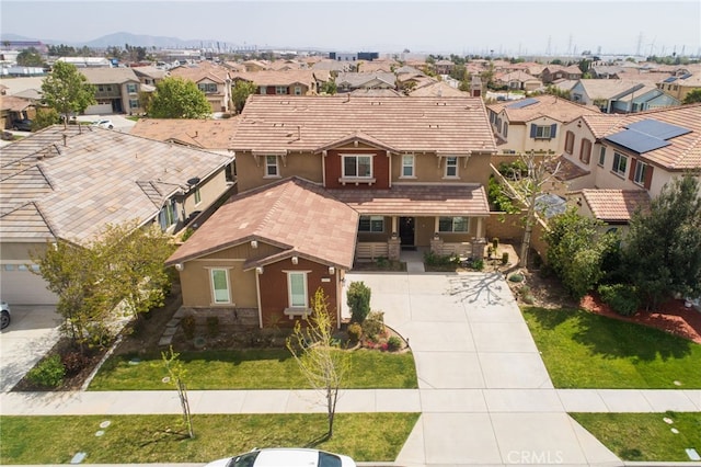 13243 Stanton Dr, Rancho Cucamonga, CA 91739 - view of front facade featuring a residential view, stucco siding, and driveway