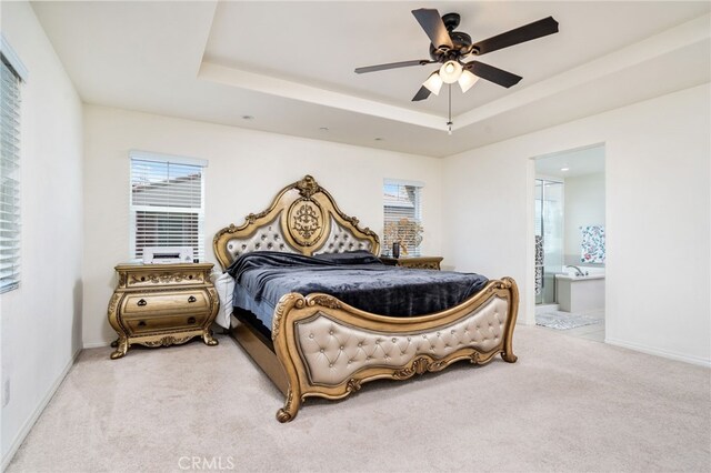13243 Stanton Dr, Rancho Cucamonga, CA 91739 - bedroom featuring light carpet, a raised ceiling, and multiple windows