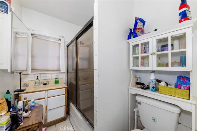 1684 E Martin Luther King Jr Blvd, Los Angeles, CA 90011 - bathroom featuring vanity and enclosed tub / shower combo