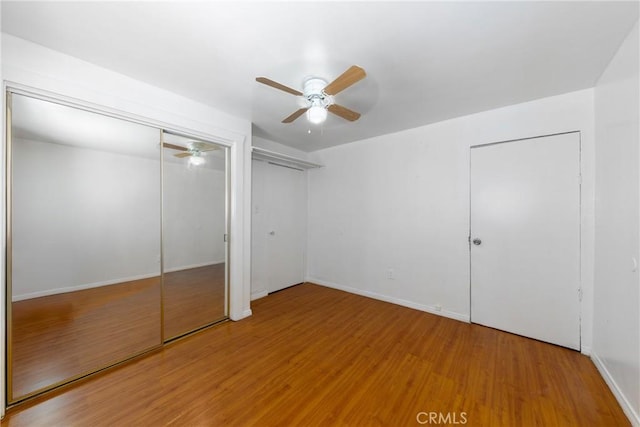 1684 E Martin Luther King Jr Blvd, Los Angeles, CA 90011 - unfurnished bedroom featuring wood finished floors and a ceiling fan