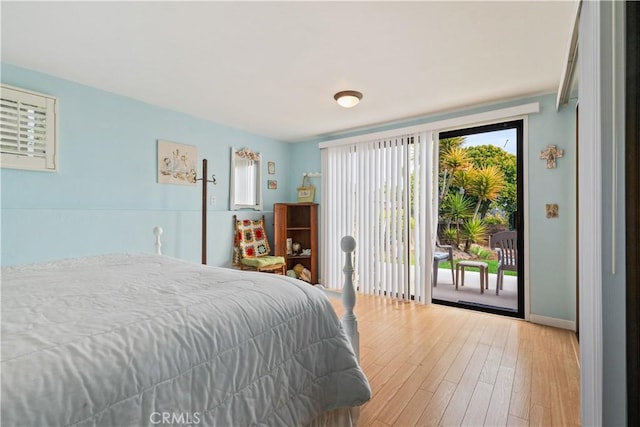 750 Luisita St, Morro Bay, CA 93442 - bedroom featuring access to outside and wood finished floors
