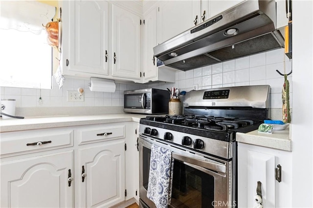 750 Luisita St, Morro Bay, CA 93442 - kitchen featuring stainless steel appliances, under cabinet range hood, decorative backsplash, white cabinetry, and light countertops