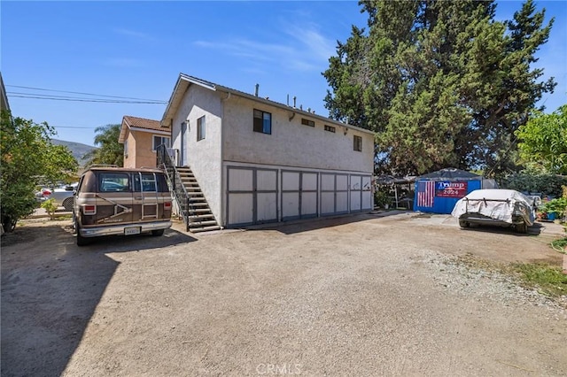 228 S 4th St, Santa Paula, CA 93060 - view of front of home featuring stairs and stucco siding