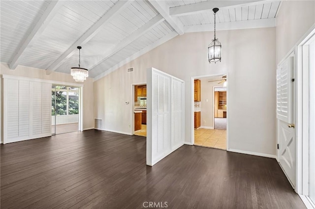 1296 Tiger Tail Dr, Riverside, CA 92506 - unfurnished living room featuring a chandelier, dark wood-style flooring, a ceiling fan, beam ceiling, and high vaulted ceiling
