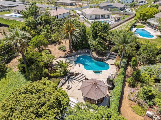1296 Tiger Tail Dr, Riverside, CA 92506 - drone / aerial view of a pool
