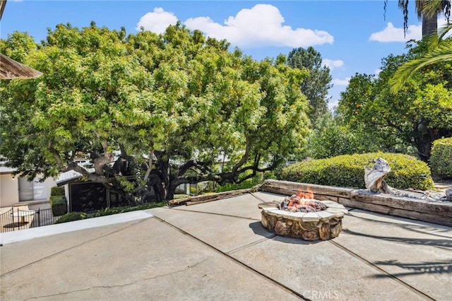1296 Tiger Tail Dr, Riverside, CA 92506 - view of patio / terrace featuring an outdoor fire pit