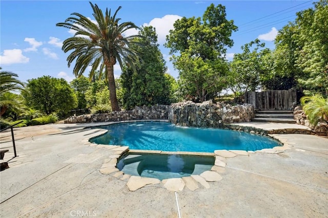 1296 Tiger Tail Dr, Riverside, CA 92506 - view of swimming pool with a patio area and a pool with connected hot tub