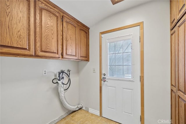 1296 Tiger Tail Dr, Riverside, CA 92506 - laundry room featuring washer hookup, cabinet space, and light tile patterned flooring
