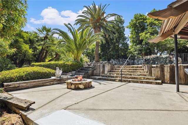 1296 Tiger Tail Dr, Riverside, CA 92506 - view of patio / terrace with stairway and an outdoor fire pit