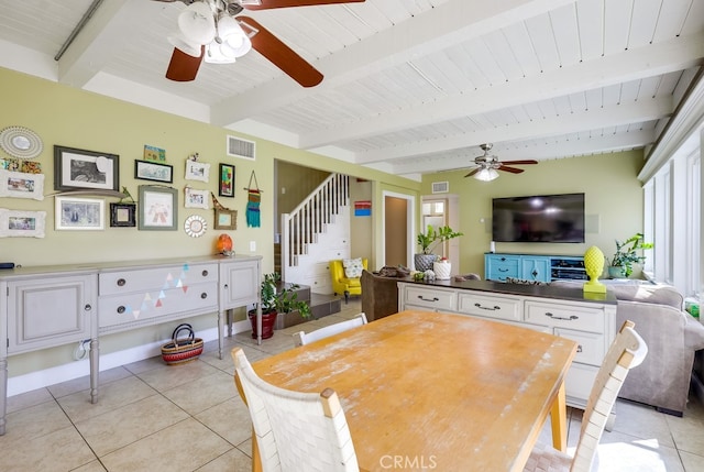 23402 Devonshire Dr, Lake Forest, CA 92630 - dining space featuring a ceiling fan, light tile patterned flooring, stairway, and beam ceiling