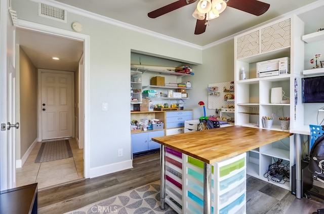 23402 Devonshire Dr, Lake Forest, CA 92630 - home office featuring a ceiling fan, crown molding, and wood finished floors