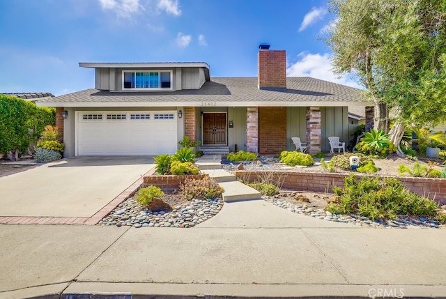 23402 Devonshire Dr, Lake Forest, CA 92630 - view of front of property with a chimney, driveway, board and batten siding, covered porch, and a garage