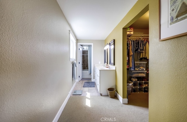 23402 Devonshire Dr, Lake Forest, CA 92630 - hall with light carpet and a textured wall
