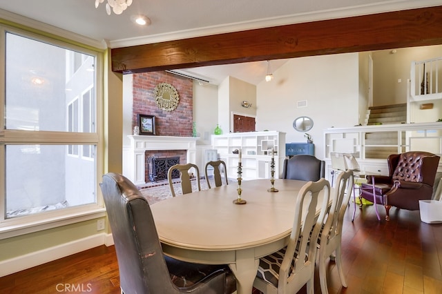 23402 Devonshire Dr, Lake Forest, CA 92630 - dining room featuring dark wood finished floors, a brick fireplace, and beam ceiling