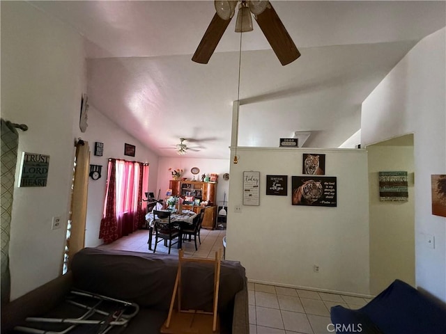 5320 Jonah St, Bakersfield, CA 93307 - tiled dining room with a ceiling fan and vaulted ceiling