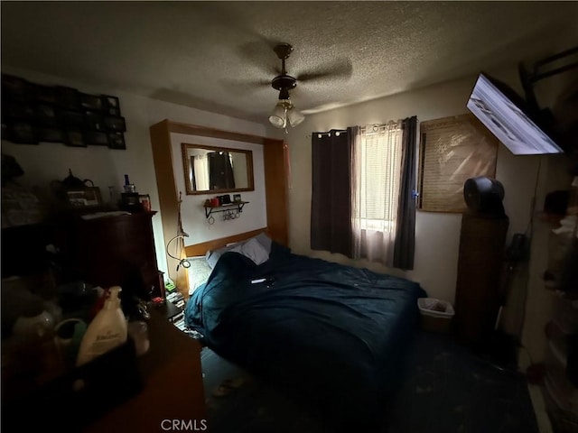 5320 Jonah St, Bakersfield, CA 93307 - bedroom featuring a textured ceiling and a ceiling fan