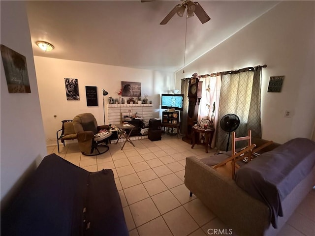 5320 Jonah St, Bakersfield, CA 93307 - living area with light tile patterned floors, a ceiling fan, vaulted ceiling, and a fireplace