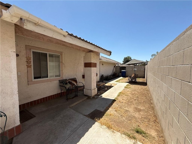 5320 Jonah St, Bakersfield, CA 93307 - fenced backyard featuring a patio
