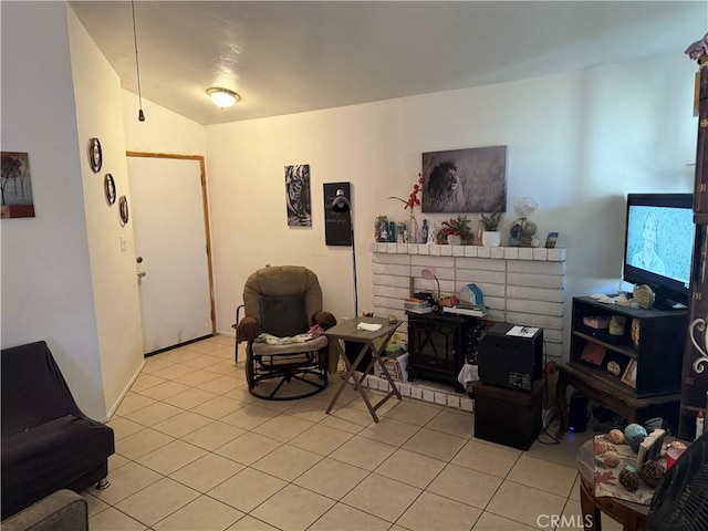 5320 Jonah St, Bakersfield, CA 93307 - living room with light tile patterned floors and vaulted ceiling