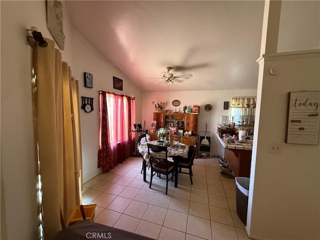 5320 Jonah St, Bakersfield, CA 93307 - dining room featuring light tile patterned floors, ceiling fan, and lofted ceiling