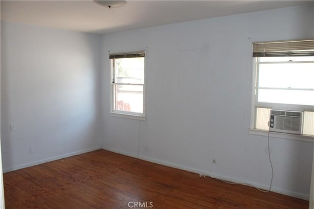 841 N Naomi St, Burbank, CA 91505 - spare room with wood finished floors and cooling unit