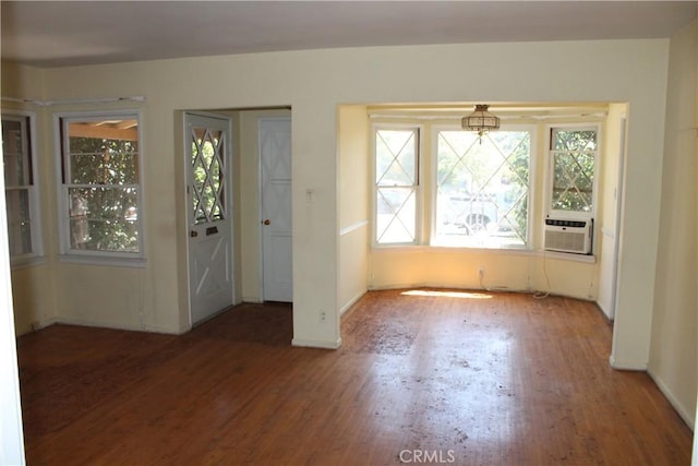 841 N Naomi St, Burbank, CA 91505 - unfurnished dining area with wood finished floors, cooling unit, and healthy amount of natural light