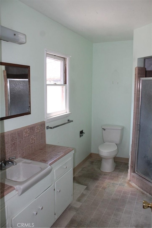 841 N Naomi St, Burbank, CA 91505 - bathroom featuring vanity, a stall shower, and tasteful backsplash
