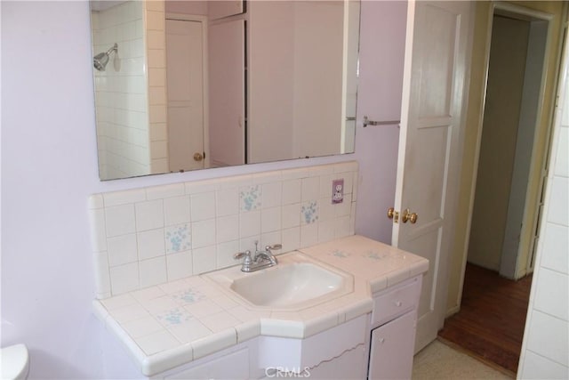 841 N Naomi St, Burbank, CA 91505 - bathroom with backsplash, vanity, and wood finished floors