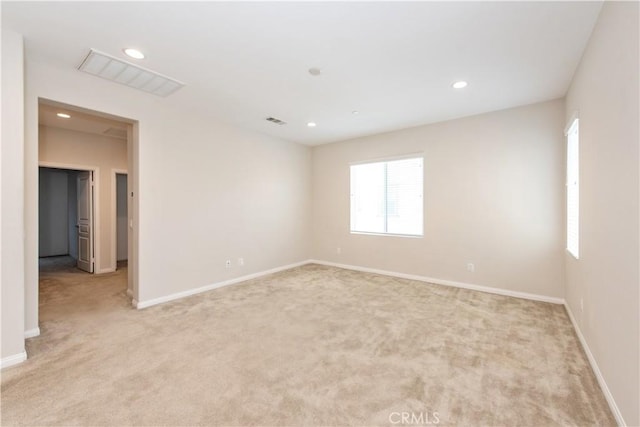 16123 Apricot Ave, Chino, CA 91708 - spare room featuring light carpet, healthy amount of natural light, and recessed lighting