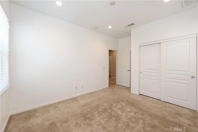 16123 Apricot Ave, Chino, CA 91708 - unfurnished bedroom with light colored carpet, recessed lighting, and a closet
