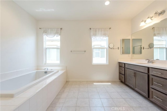 16123 Apricot Ave, Chino, CA 91708 - full bathroom with vanity, a bath, and tile patterned flooring