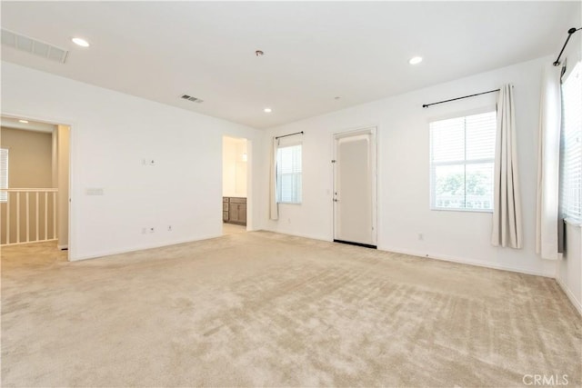 16123 Apricot Ave, Chino, CA 91708 - empty room with light colored carpet and recessed lighting