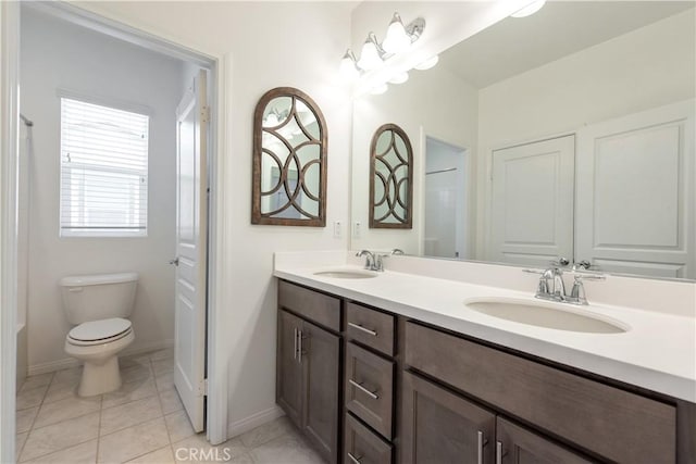 16123 Apricot Ave, Chino, CA 91708 - bathroom featuring double vanity and tile patterned floors