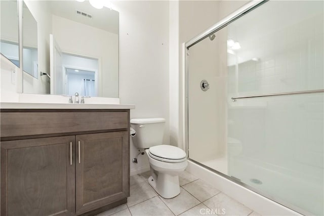16123 Apricot Ave, Chino, CA 91708 - full bathroom with tile patterned floors, a shower stall, and vanity