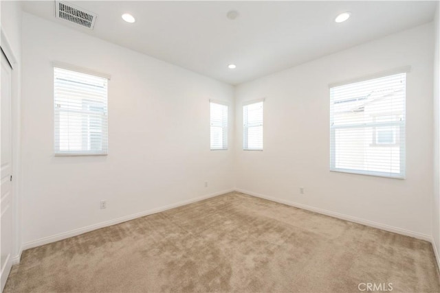 16123 Apricot Ave, Chino, CA 91708 - empty room with light carpet and recessed lighting