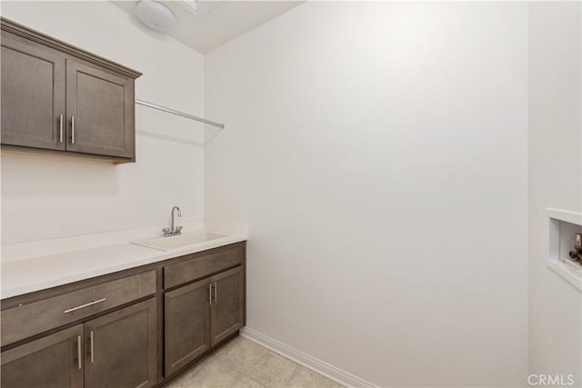 16123 Apricot Ave, Chino, CA 91708 - laundry area with hookup for a washing machine and cabinet space