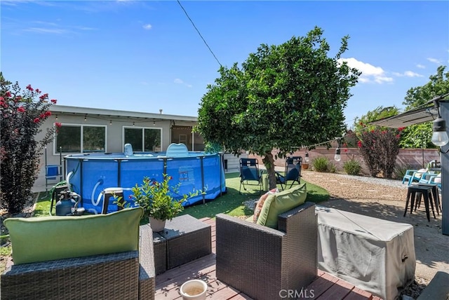 9811 Kempster Ave, Fontana, CA 92335 - fenced backyard featuring outdoor lounge area