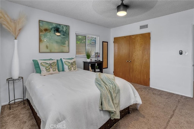 9811 Kempster Ave, Fontana, CA 92335 - bedroom featuring carpet floors, a textured ceiling, a closet, and a ceiling fan