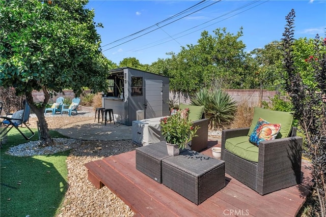 9811 Kempster Ave, Fontana, CA 92335 - wooden terrace with a storage shed, an outdoor hangout area, and a patio
