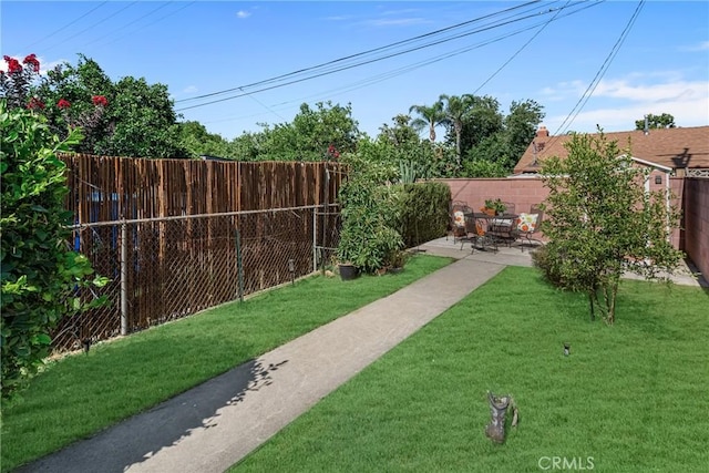 9811 Kempster Ave, Fontana, CA 92335 - fenced backyard featuring a patio area