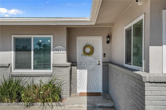 9811 Kempster Ave, Fontana, CA 92335 - view of exterior entry with stucco siding
