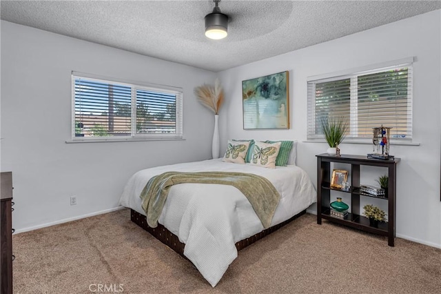 9811 Kempster Ave, Fontana, CA 92335 - bedroom featuring carpet, a textured ceiling, and ceiling fan