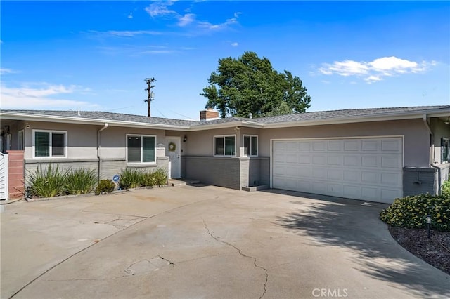 9811 Kempster Ave, Fontana, CA 92335 - single story home featuring stucco siding, an attached garage, driveway, and brick siding