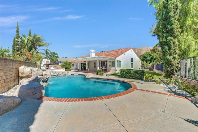 5560 Feather Grass Ln, Yorba Linda, CA 92887 - view of swimming pool featuring a patio area and a fenced backyard