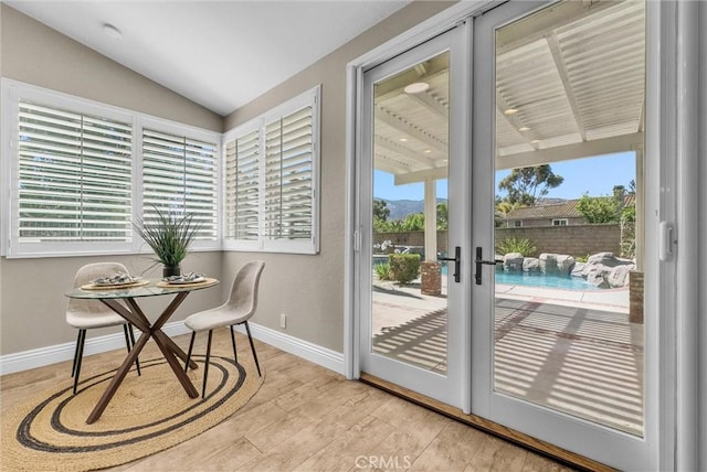 5560 Feather Grass Ln, Yorba Linda, CA 92887 - doorway to outside featuring wood finished floors, vaulted ceiling, and french doors