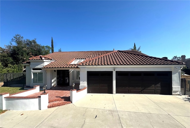 5560 Feather Grass Ln, Yorba Linda, CA 92887 - view of front of property with concrete driveway, a tile roof, a garage, and stucco siding