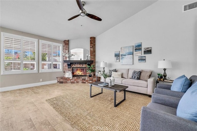 5560 Feather Grass Ln, Yorba Linda, CA 92887 - living area featuring a ceiling fan, vaulted ceiling, a brick fireplace, and wood finished floors
