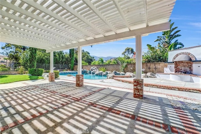 5560 Feather Grass Ln, Yorba Linda, CA 92887 - fenced backyard with a patio, exterior kitchen, and a pergola