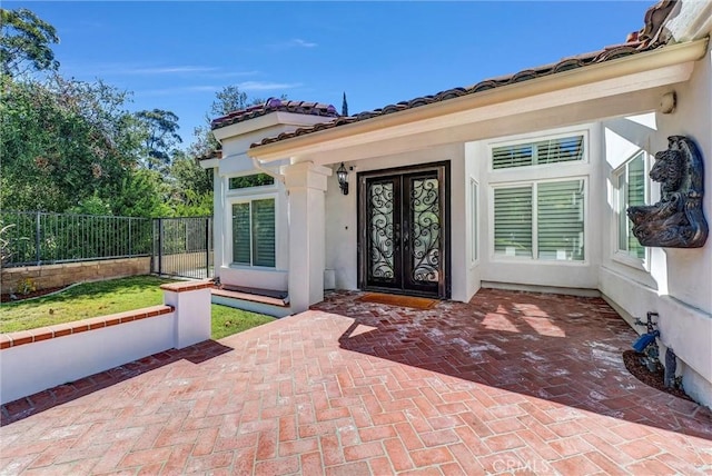 5560 Feather Grass Ln, Yorba Linda, CA 92887 - entrance to property with stucco siding and french doors