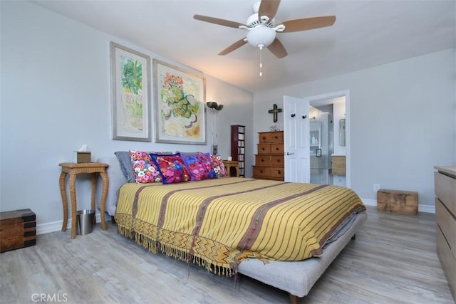 4140 Warner Blvd Unit 302, Burbank, CA 91505 - bedroom featuring wood finished floors, ceiling fan, and ensuite bath